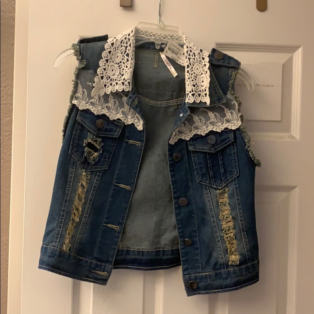 Distressed jean jacket with lace